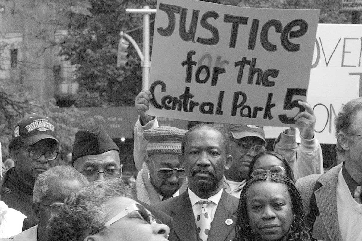 Oct. 21, 2002—Supporters rally in front of Manhattan Supreme Court to demand the 1990 convictions of Yusef Salaam, Korey Wise, Antron McCray, Kevin Richardson, and Raymond Santana be overturned. (AP Photo/Robert Mecea)