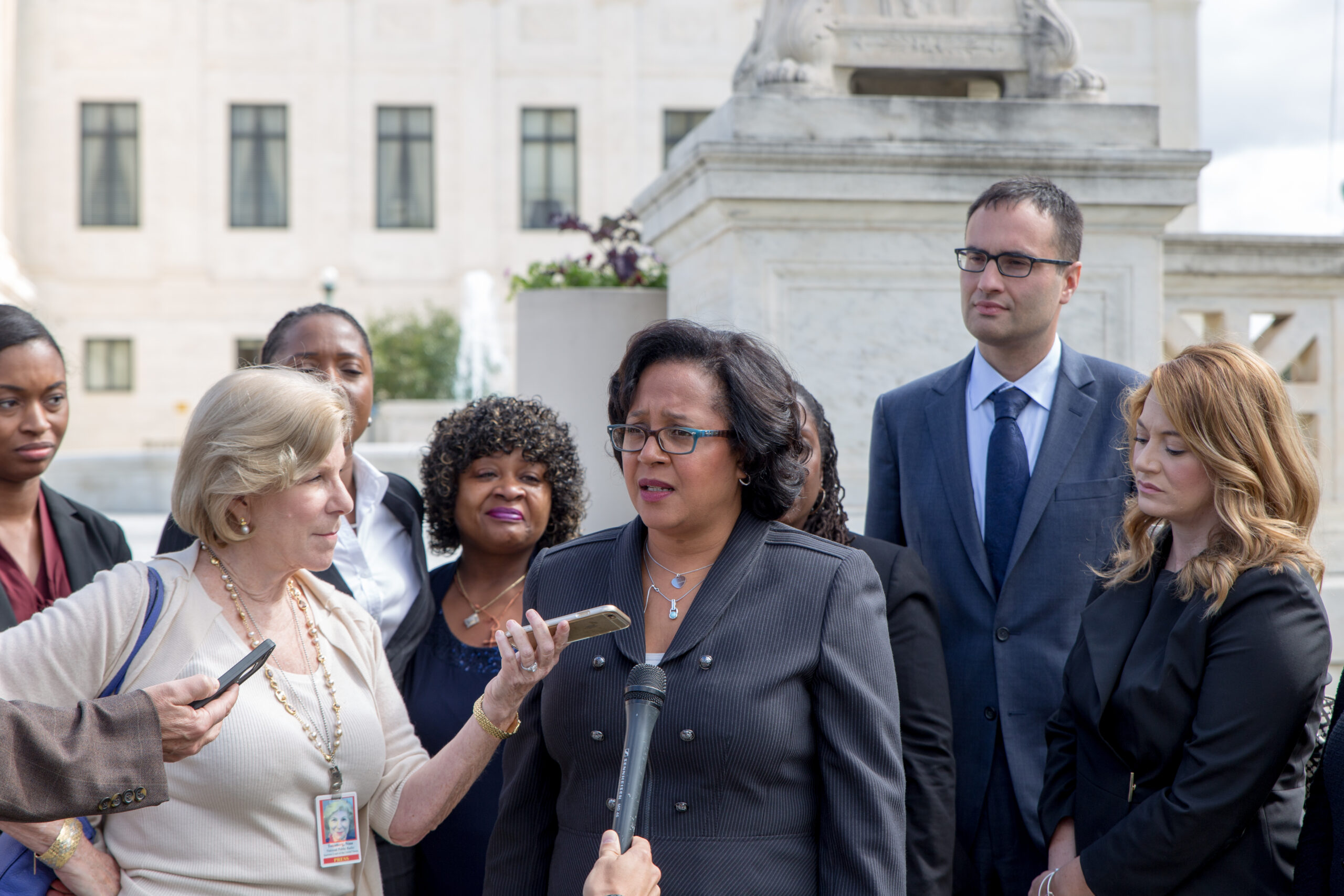 Innocence Project executive director Christina Swarns speaking to the press on the steps of the Supreme Court after winning Buck vs. Davis in 2016. Image: Courtesy of Christina Swarns. 
