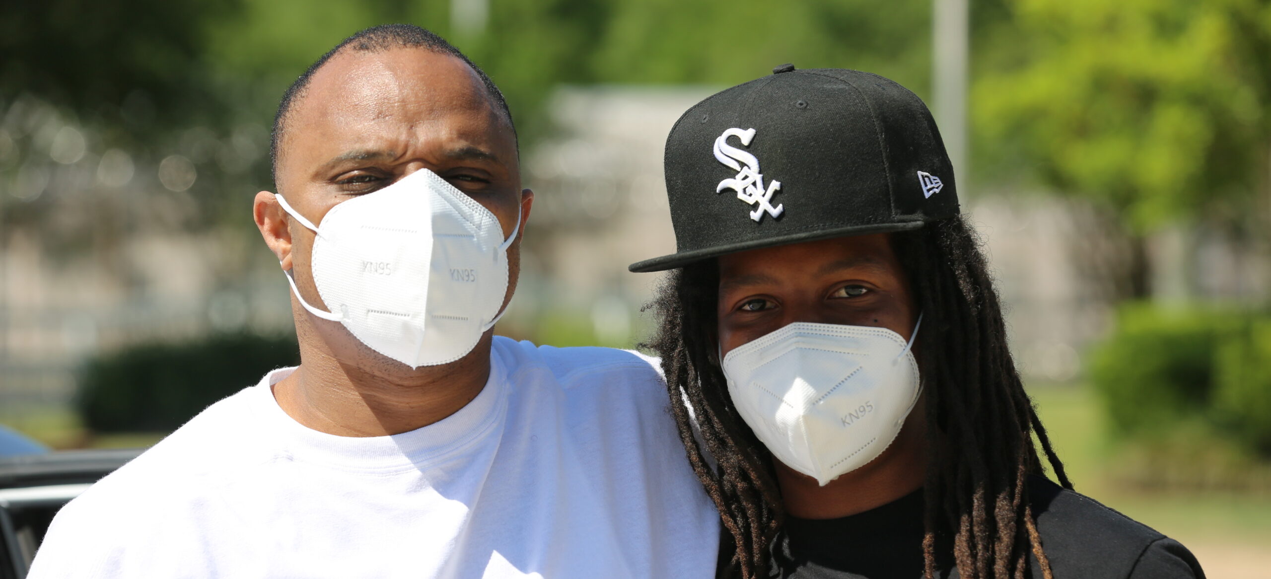 Darrill Henry poses with his son, Darrill Jr., after his release on May 7, 2020. (Image: David S. White/Innocence Project)