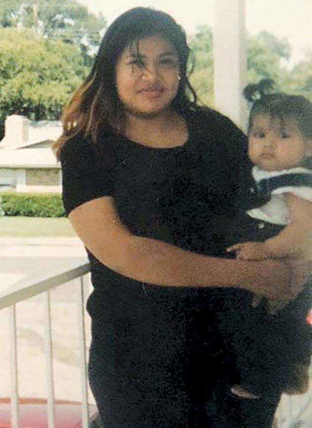 Rosa Jimenez holding her daughter Brenda. (Image: Courtesy of Rosa Jimenez)