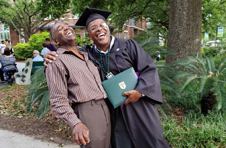Calvin Duncan (right) at his graduation from Tulane University, with his friend David Menschel (left). (Image: Courtesy of Calvin Duncan)