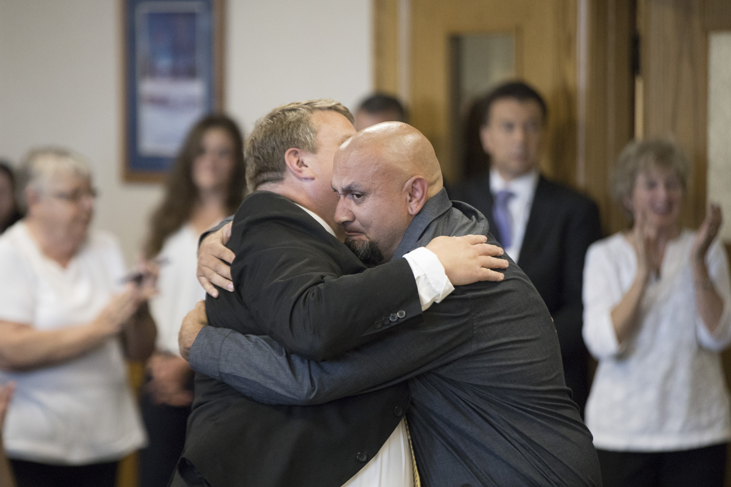 Christopher Tapp hugging his lawyer John K. Thomas  - Post Conviction Relief Proceedings on Wednesday, July 17, 2019 in Idaho Falls, Idaho. (Image: Otto Kitsinger/AP Images for The Innocence Project)