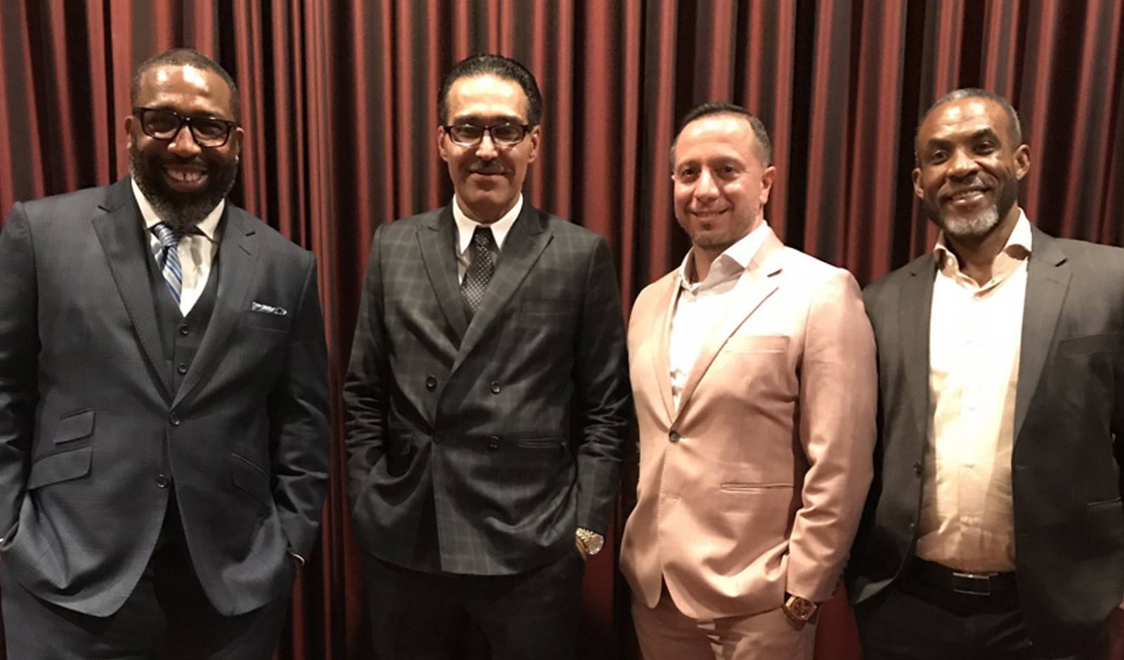 Anthony Wright, Felipe Rodriguez, Johnnie Hincapie, and Everton Wagstaffe in their custom Bindle & Keep suits at the May 2017 Innocence Project gala. 