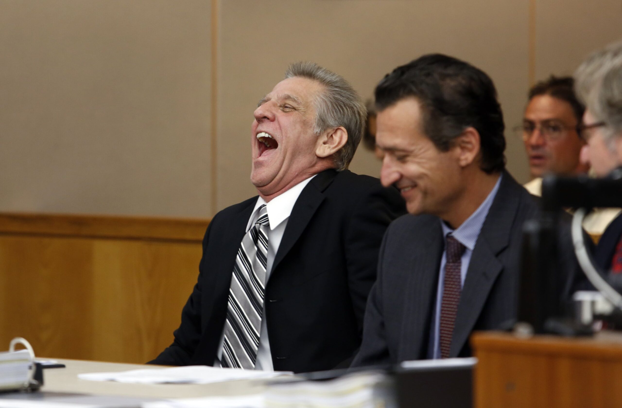 Steven Mark Chaney reacts to his release during a hearing in a Dallas courtroom where a court reversed his 1987 murder conviction because of discredited bite mark testimony on Oct. 12, 2015. Innocence Project Attorneys M. Chris Fabricant and Barry C Scheck are on the right. (Image: Lara Solt)