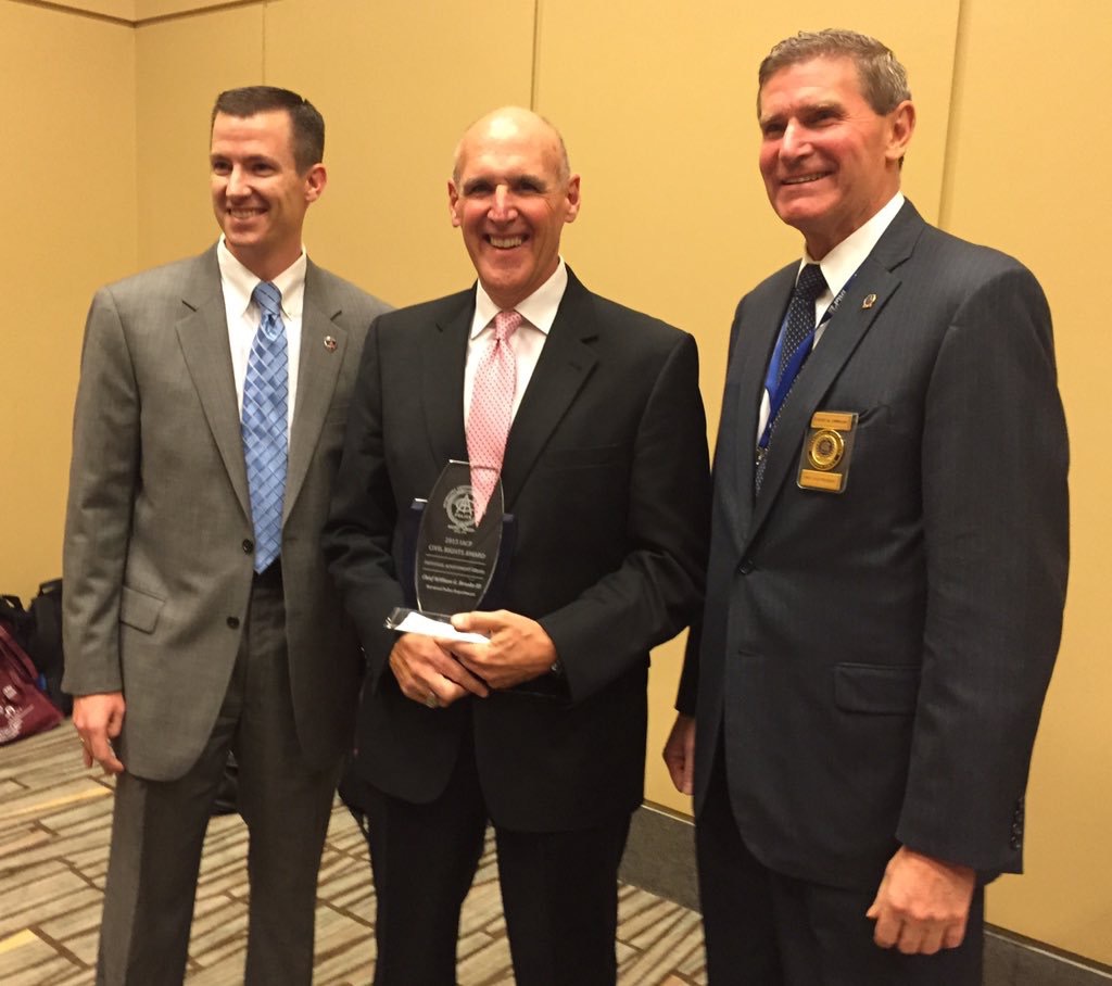 Chief Bill Brooks (center) receives the IACP Civil Rights award for Individual Achievement at the IACP annual conference in Chicago. 