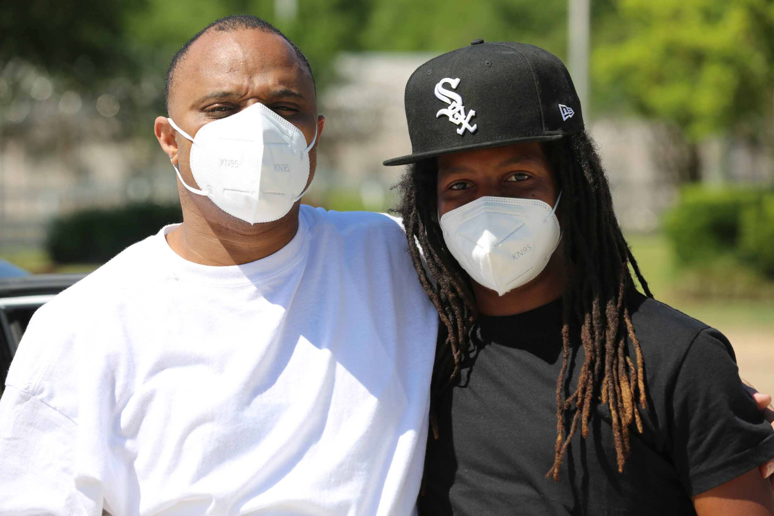 Darrill Henry poses with his son, Darrill Jr., after his release on May 7, 2020. (Image: David S. White/Innocence Project)