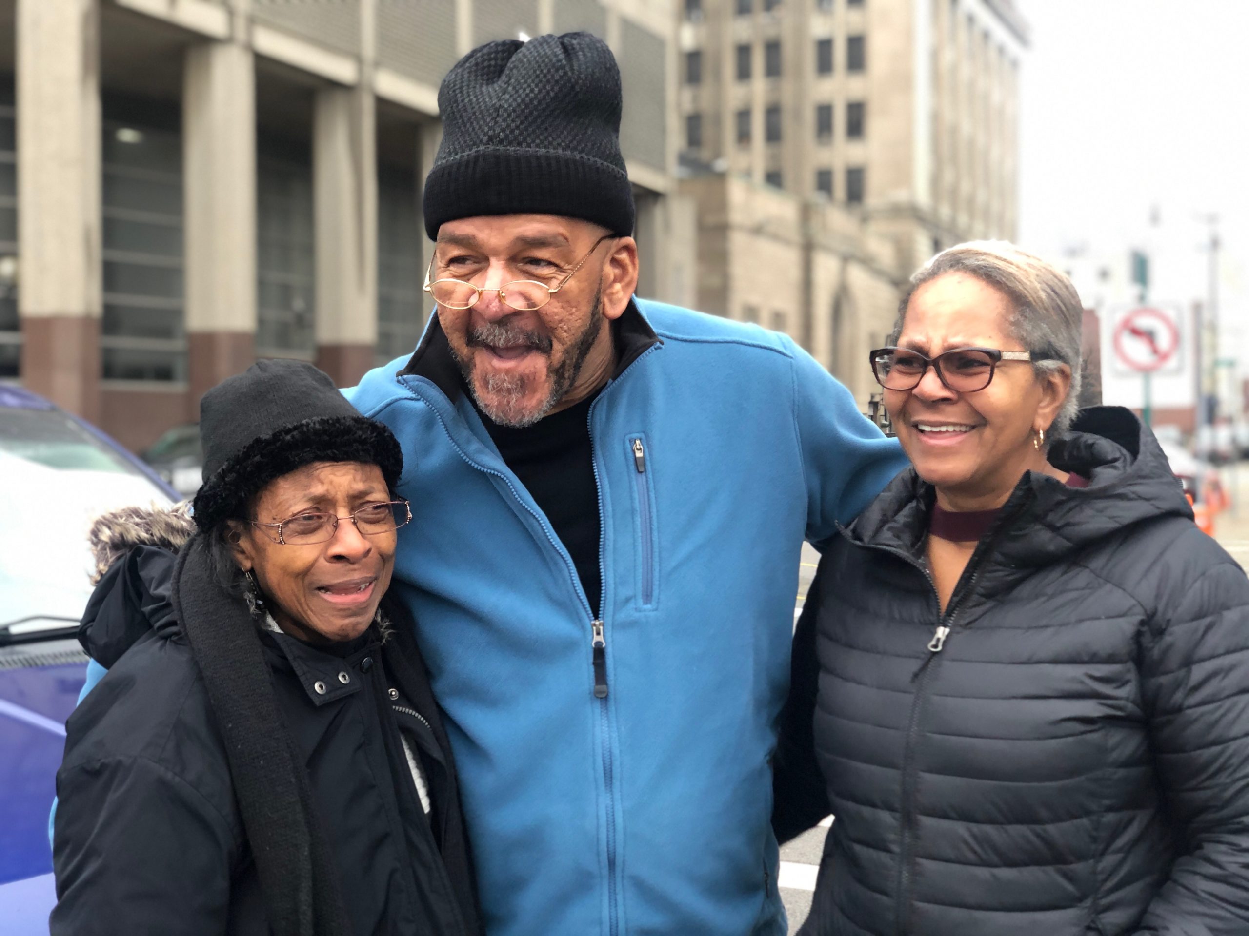 Gerry Thomas and his sisters Lois and Mary moments after his exoneration and release from 29 years in prison on January 13, 2020. Photo by Suzy Salamy/Innocence Project.