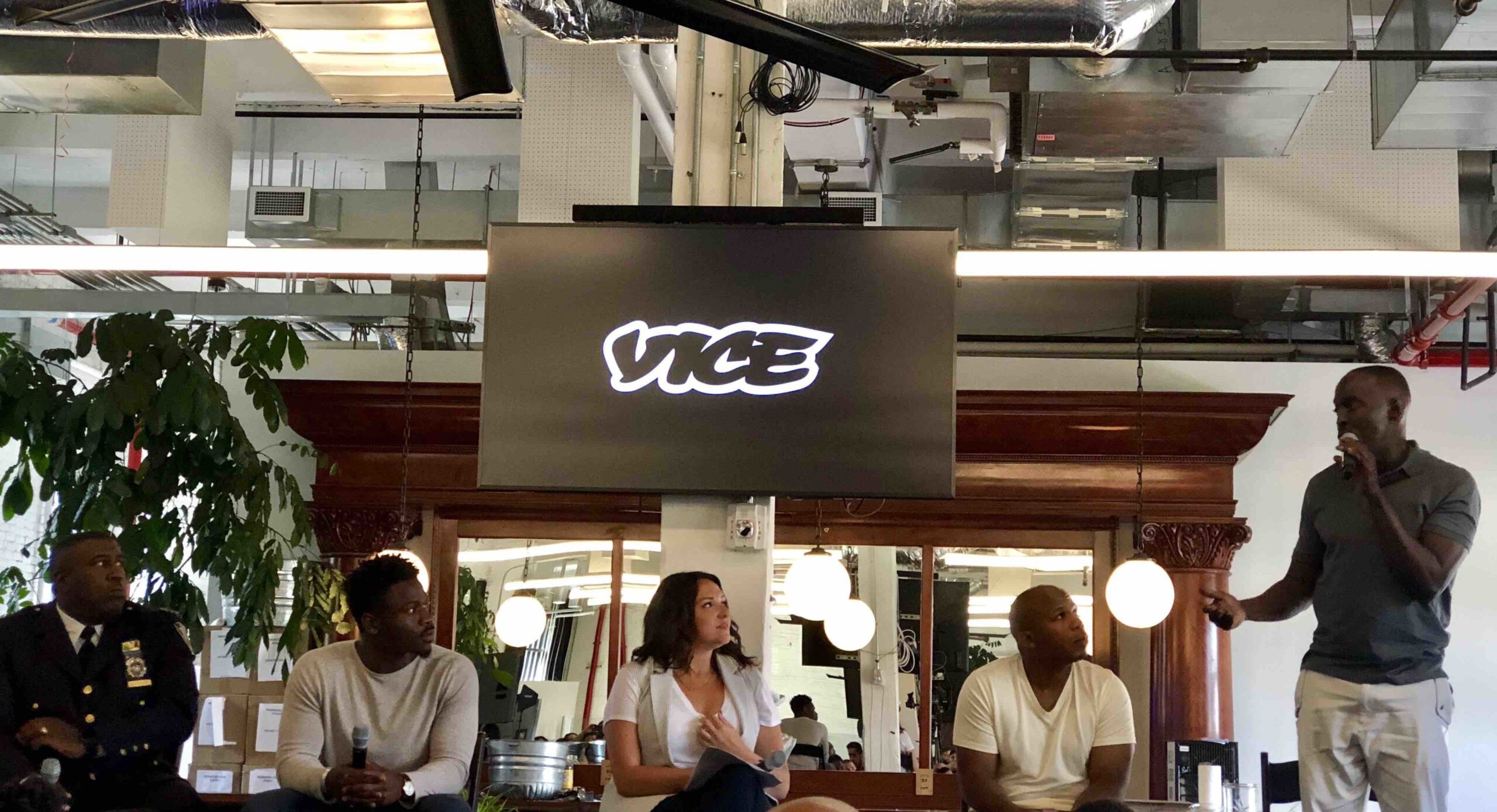 (L-R): Chief Jeffrey Maddrey; Jim St. Germaine; Dominic Dupont; and Michael K Williams speaking on a panel at VICE headquarters.