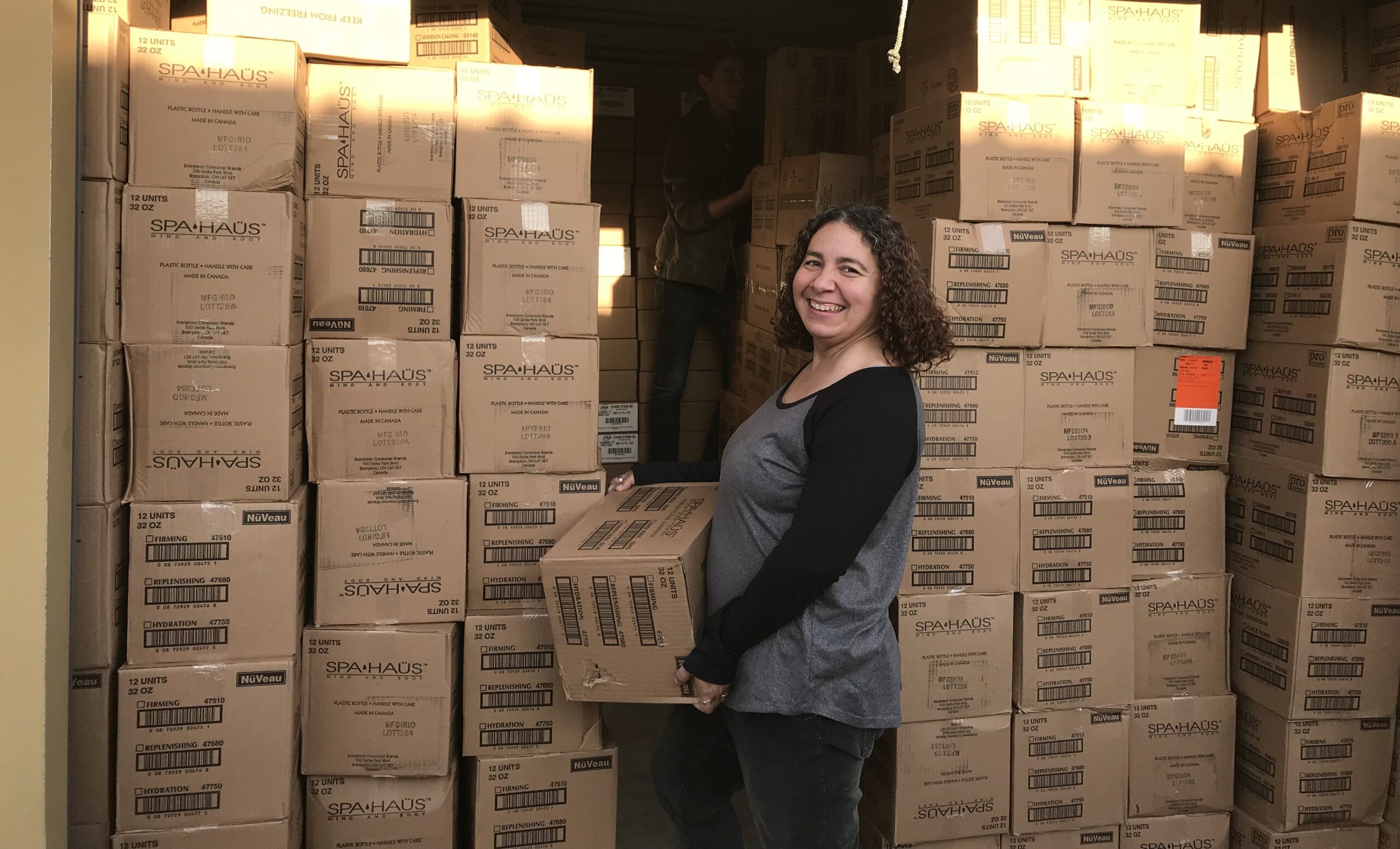 Hannah Overton preparing donations for delivery in 2019. (Image: Debi Brinker/Syndeo Ministries)