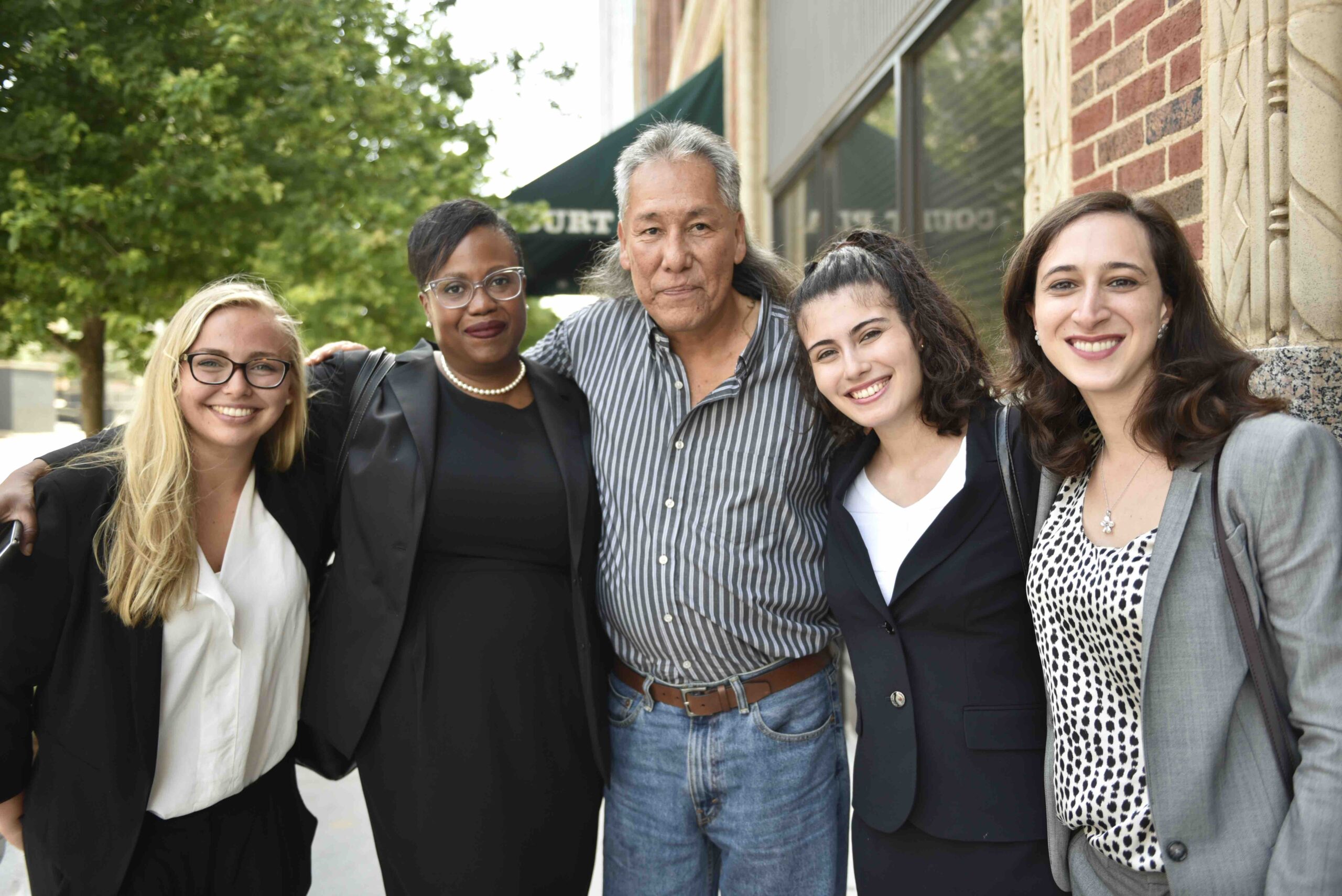 Tall Bear with his legal team from the Innocence Project (L-R): paralegal Corey Michon, senior staff attorney Karen Thompson, Cardozo law clinic student Natalia Mata and investigations attorney Dara Gell. Photo by Nick Oxford.