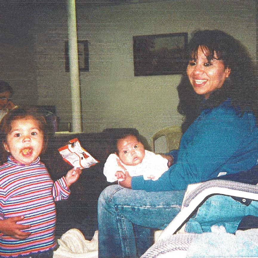 Melissa Lucio and her family before she was wrongly sentenced to death. (Image: Courtesy of the Lucio family). 