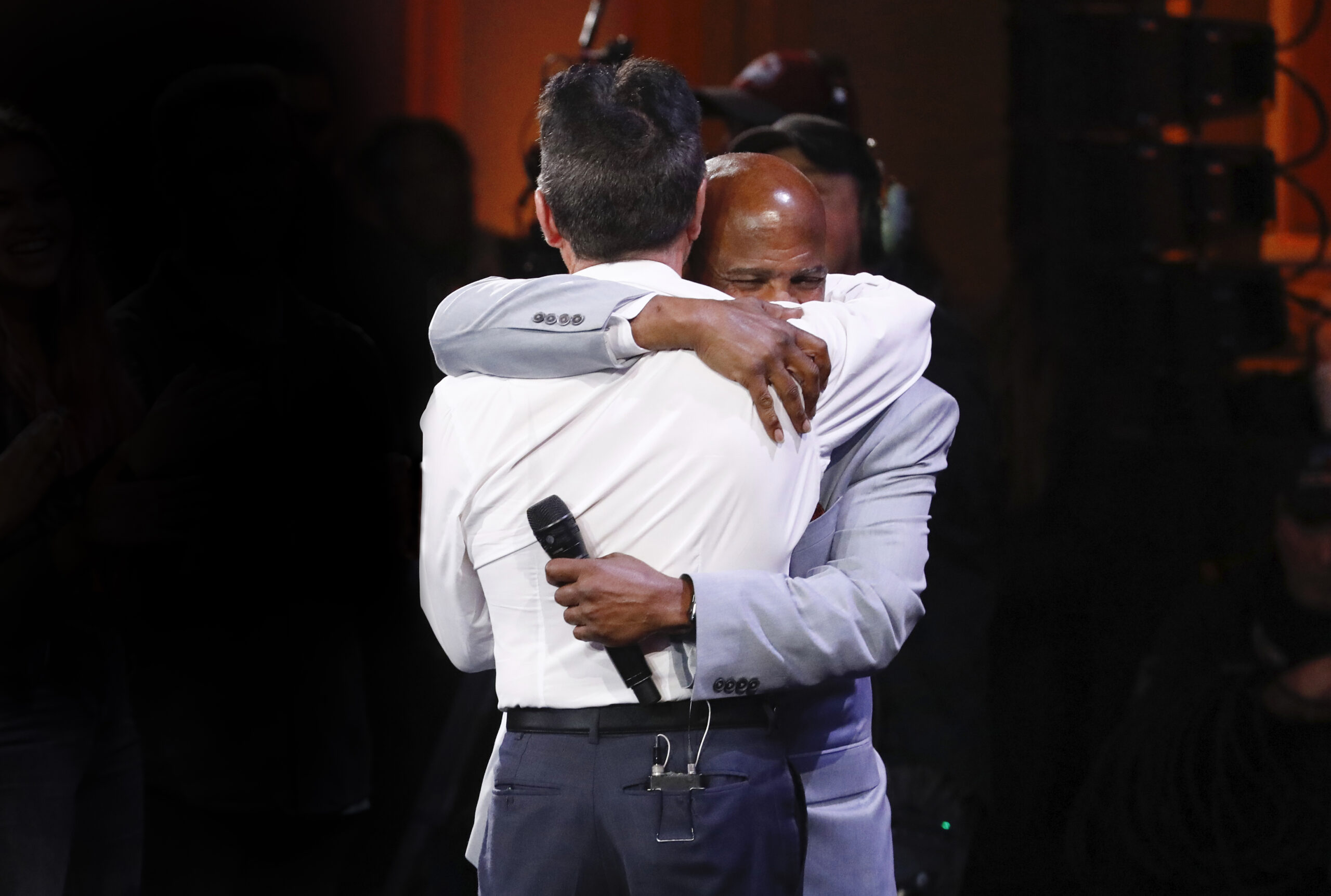 America's Got Talent. Pictured: Simon Cowell hugging Archie Williams (Photo by: Trae Patton/NBC)