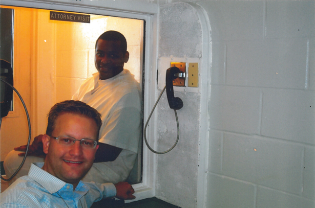Brian Stolarz visiting his client Dewayne Brown in a Texas prison. Brown's case was featured in 