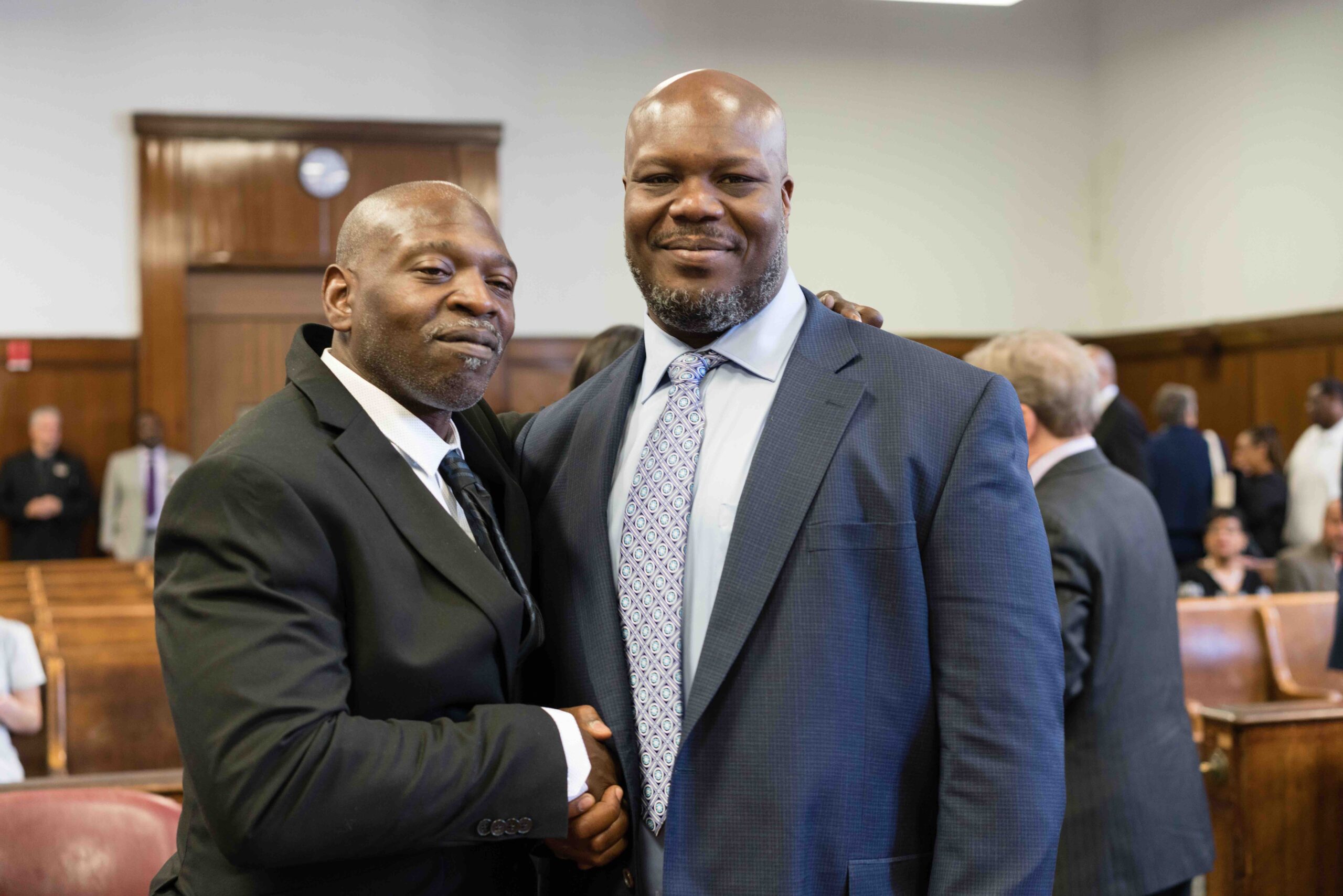 VanDyke Perry and Gregory Counts at their exoneration. Photo by Sameer Abdel-Khalek.