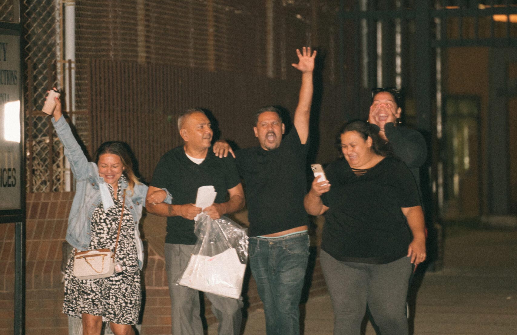 Exoneration Project client Arthur Almendarez walking out of Cook County Jail with his family after 35 years in prison for a crime he didn't commit. (Image: Ray Abercrombie for the Innocence Project)