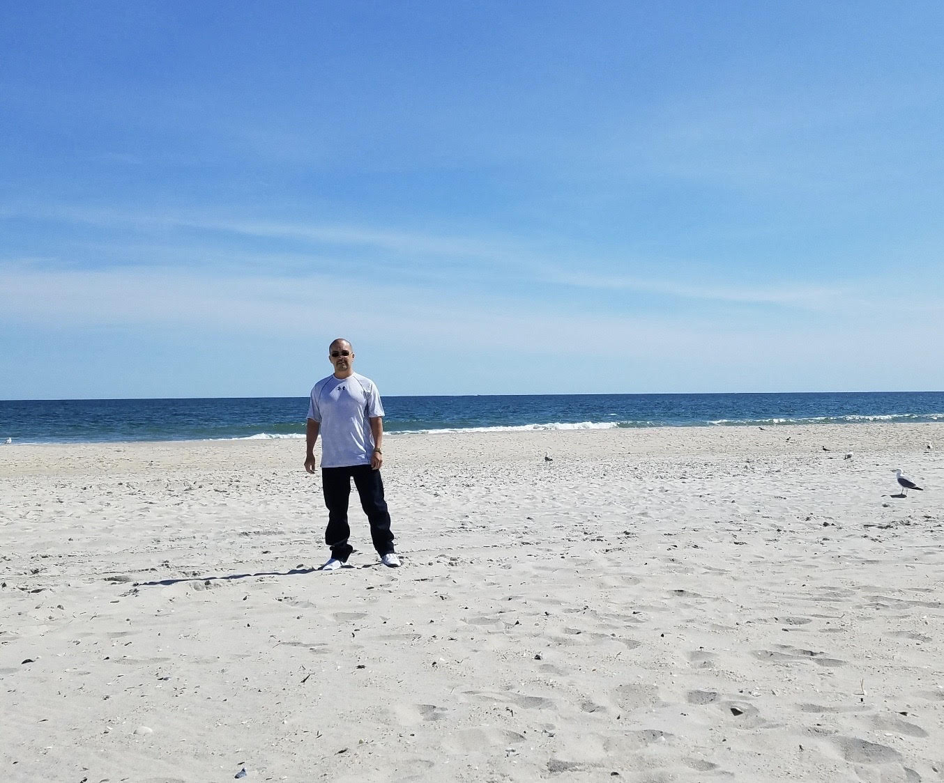 Carlos Sanchez, who spent 25 years in prison for a crime he and his attorneys maintain he did not commit, on the beach for the first time.