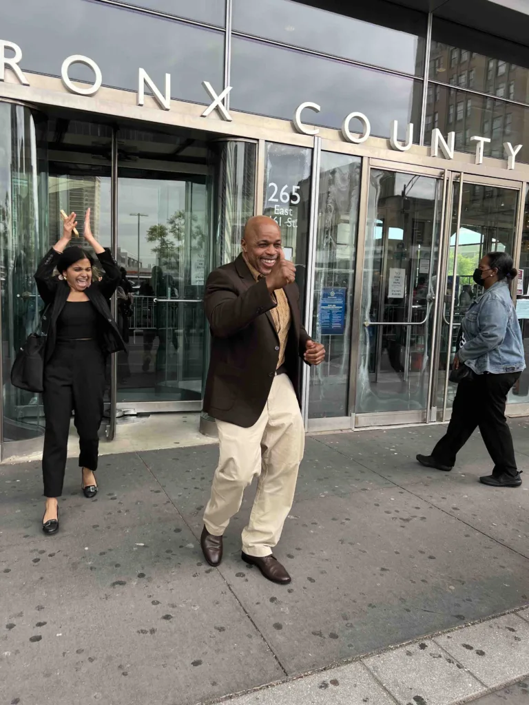 Norberto Peets dancing outside a the Bronx courthouse following his exoneration on May 9, 2023 (Image: Dani Selby/Innocence Project)