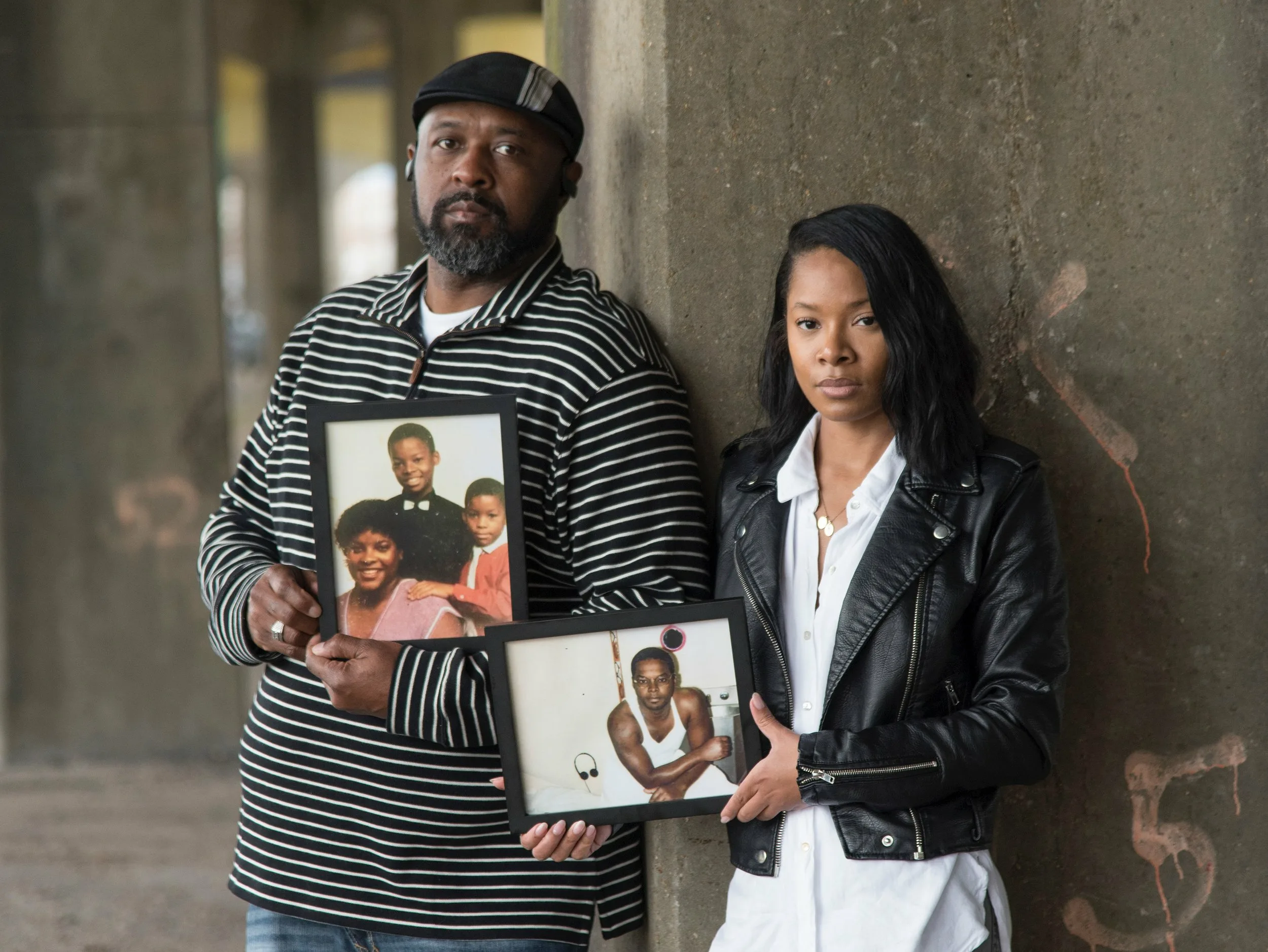 Toforest Johnson's Family Members, daughter Shanaye Poole and cousin Tony Green with photos of Mr. Johnson.  Photos by Bernard Troncale.