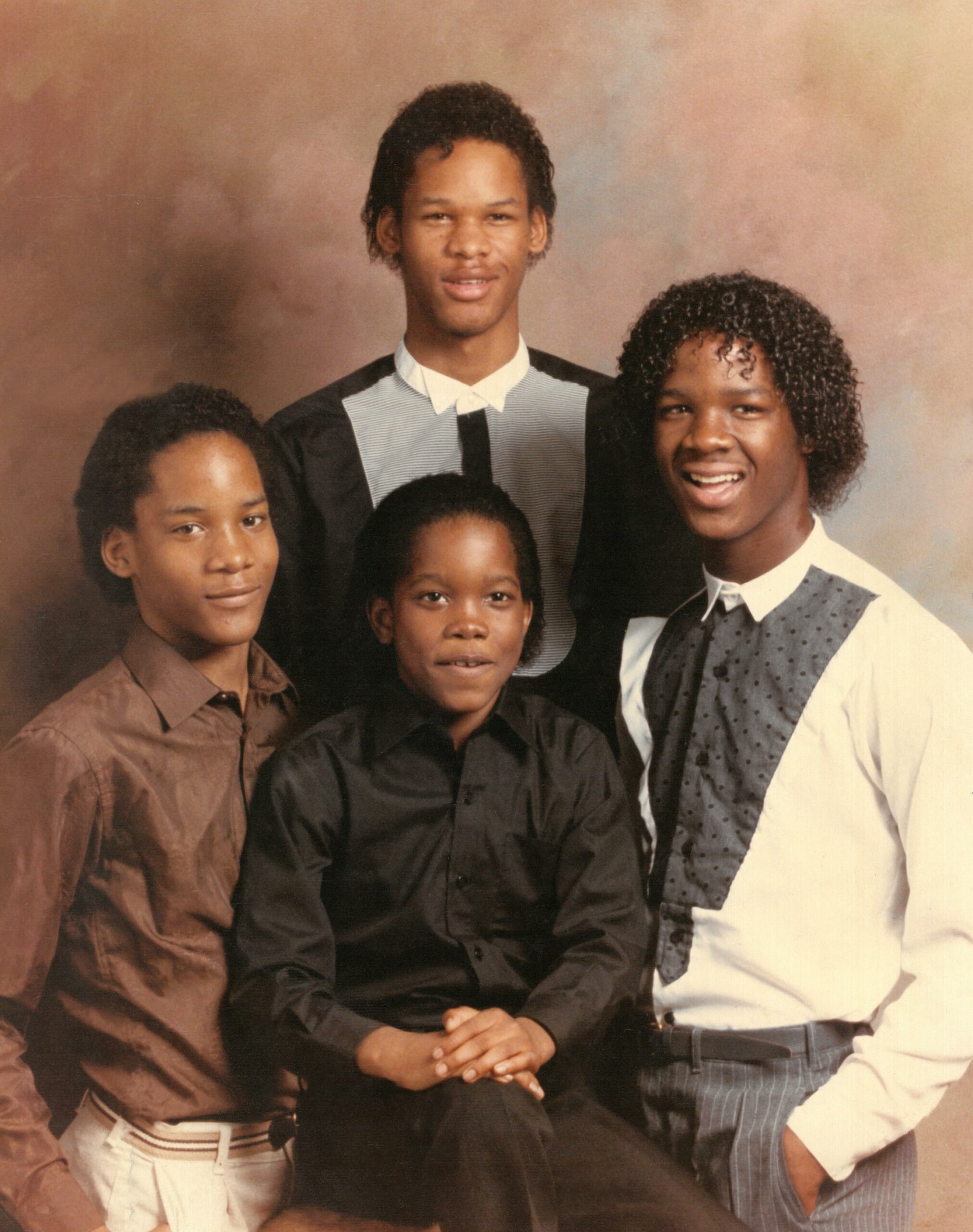 Marcellus Williams (left) with his family. Images courtesy of the Williams family. 