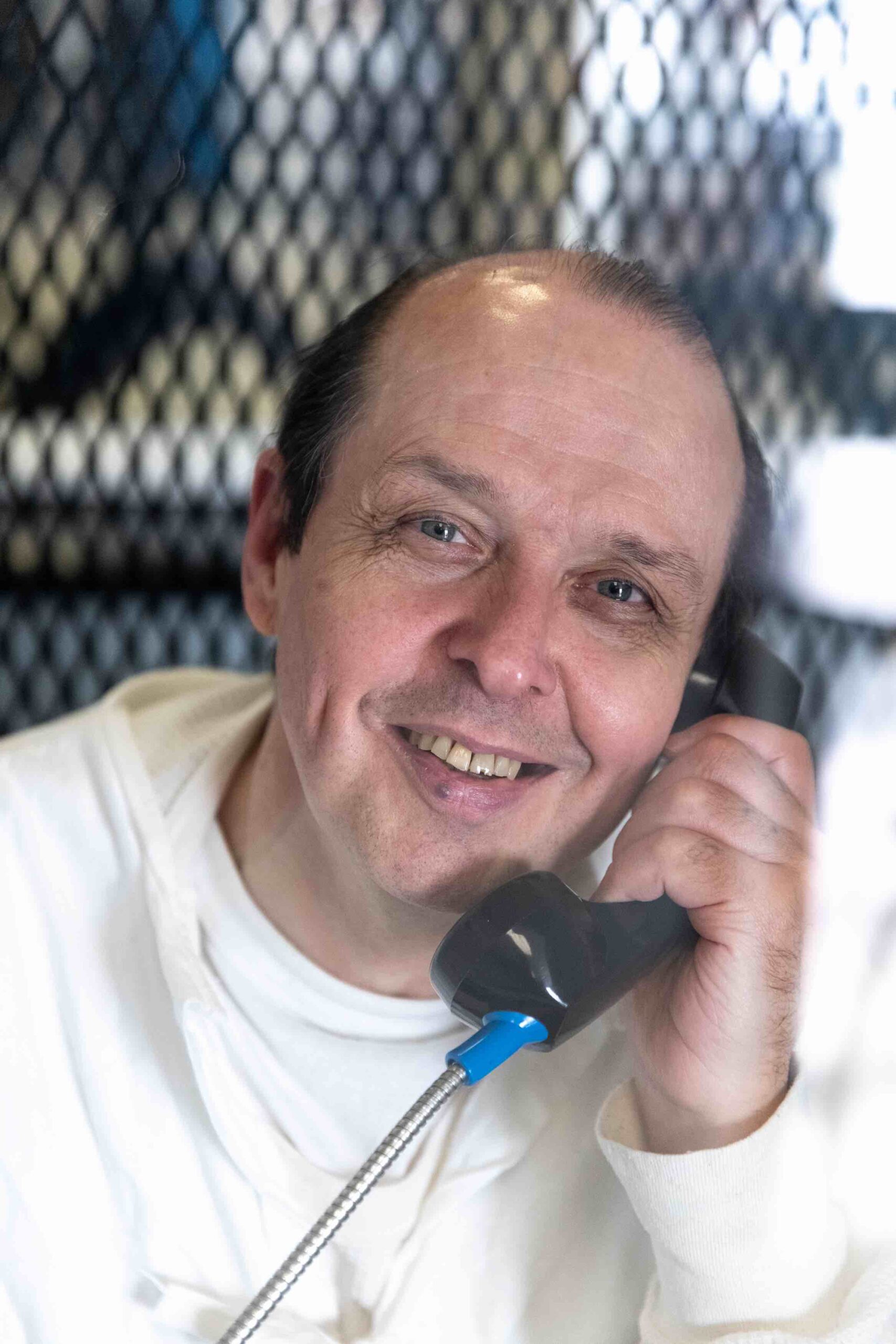 12/19/23, Livingston, Texas: Robert Roberson photographed through plexiglass at TDCJ Polunsky Unit. Ilana Panich-Linsman for The Innocence Project