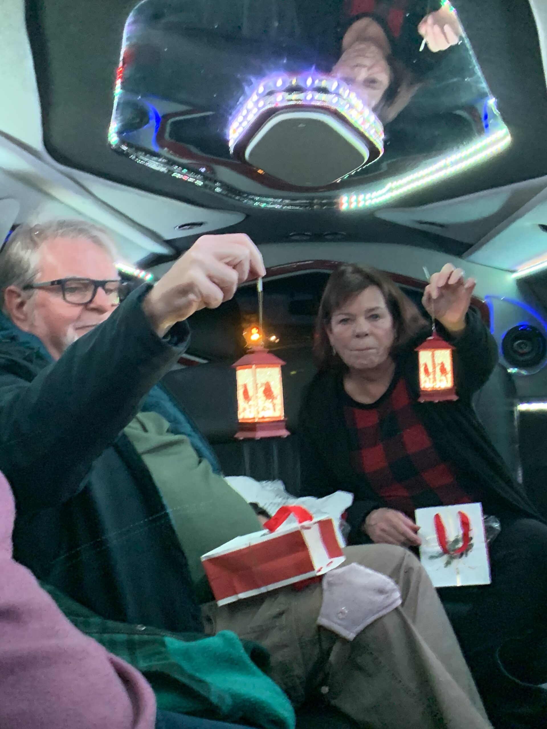 Christmas 2020: Marvin and Sharon hold ornaments given to them as gifts in remembrance of their mother who passed in 2015. (photo courtesy of Grimm family)