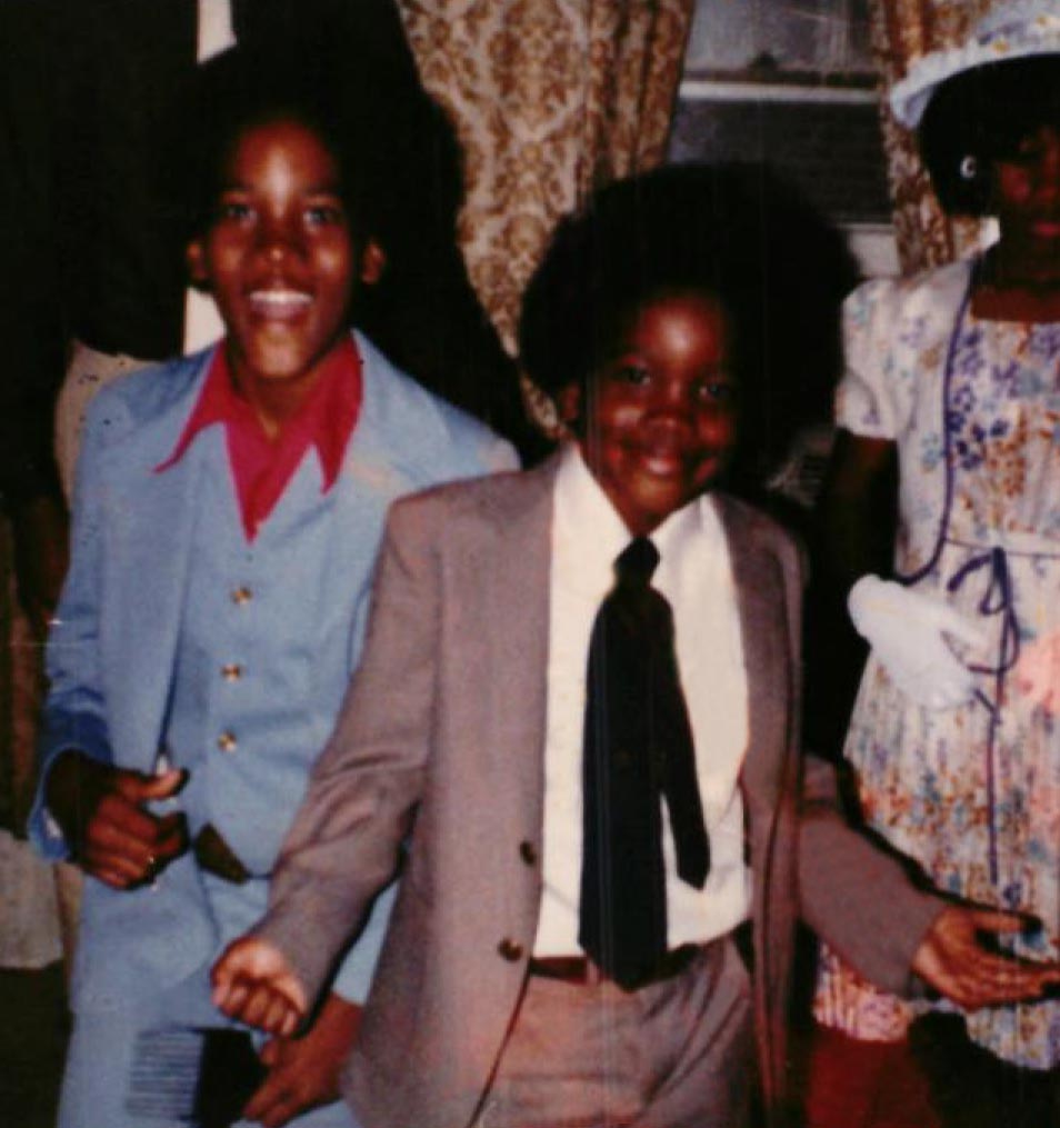 Marcellus Williams (left) with his family. Images courtesy of the Williams family. 