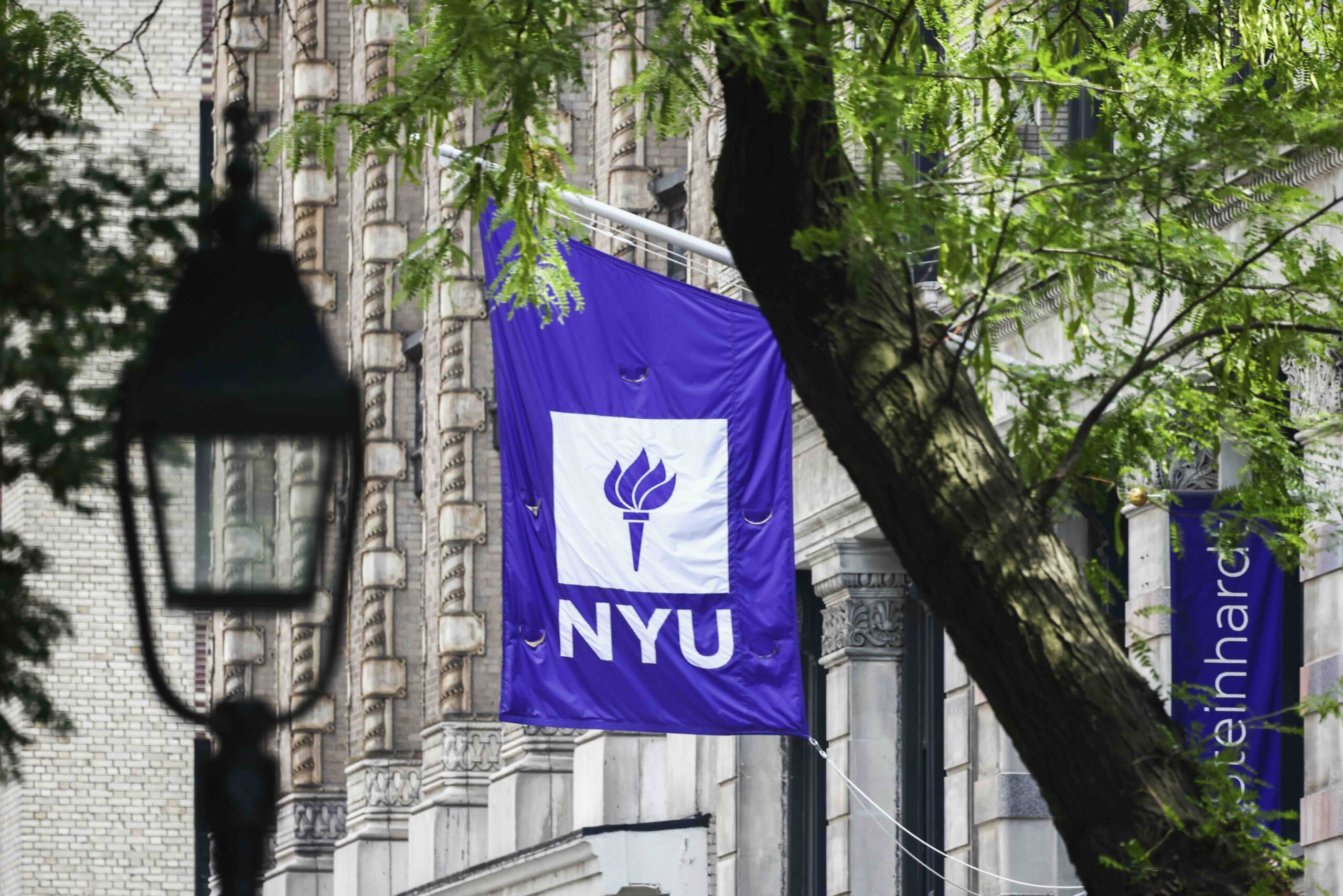 New York University logo is seen in Greenwich Village, New York, United States of America, on July 5th, 2024. (Photo by Beata Zawrzel/NurPhoto via AP)