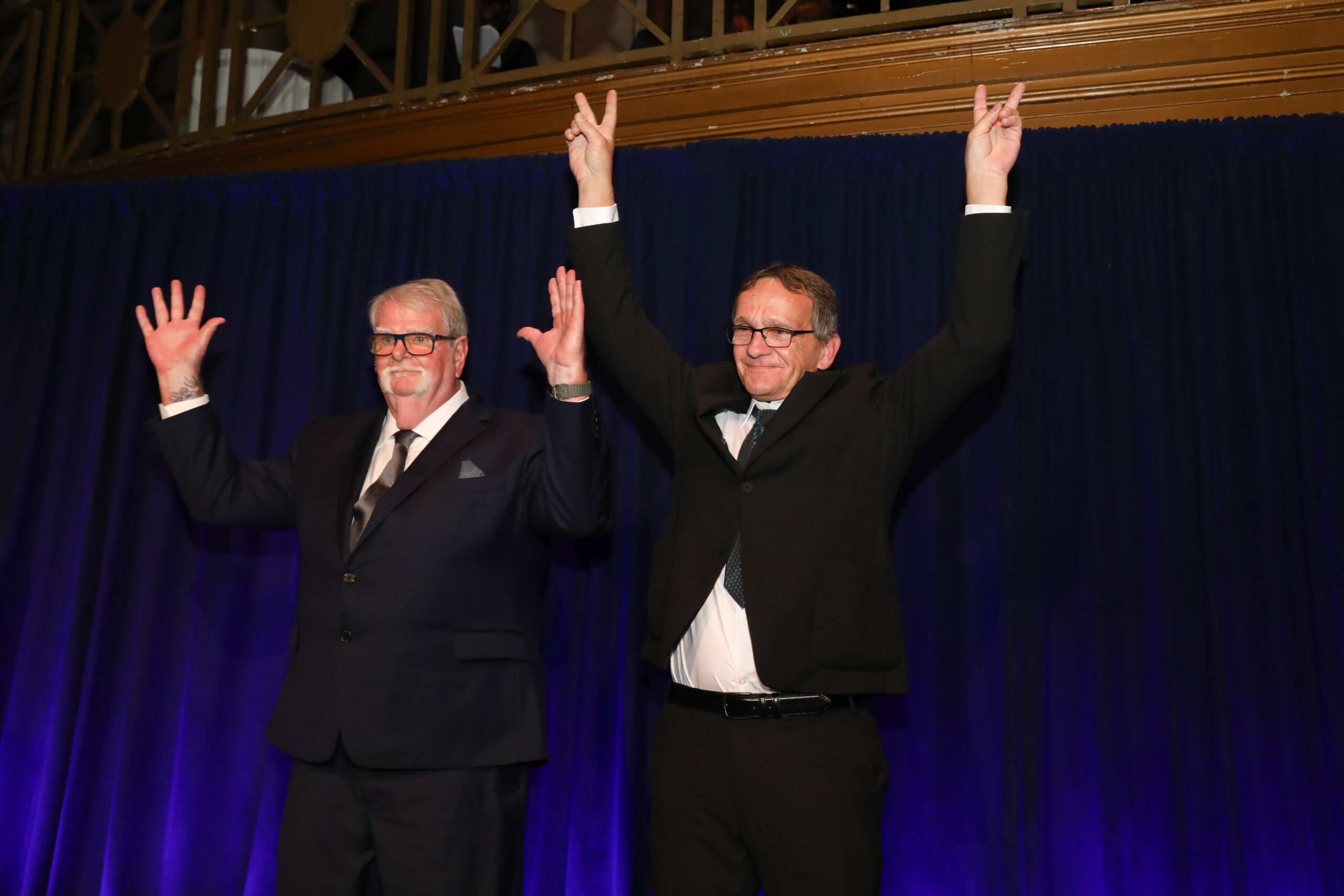Marvin Grimm, Jr. and Scott Minton take the stage at the 2025 “Celebration of Freedom & Justice.” (Image: Matthew Adam Photography/Innocence Project)