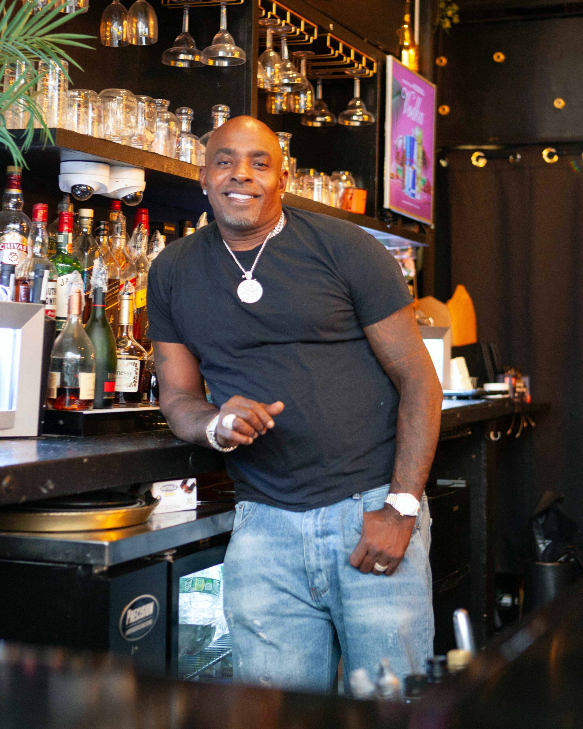 Jabar Walker at Lux Bar and Grill, which he co-owns with his brother, on July 28, 2026. (Image: Daniele Selby/Innocence Project)